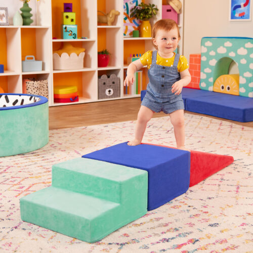 Child walking on foam climbers